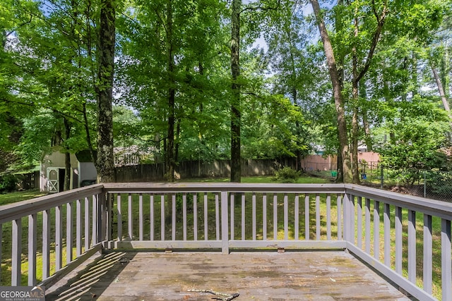3110 Ashly Cove Ln, Snellville, GA 30078 - wooden terrace featuring a fenced backyard and a shed