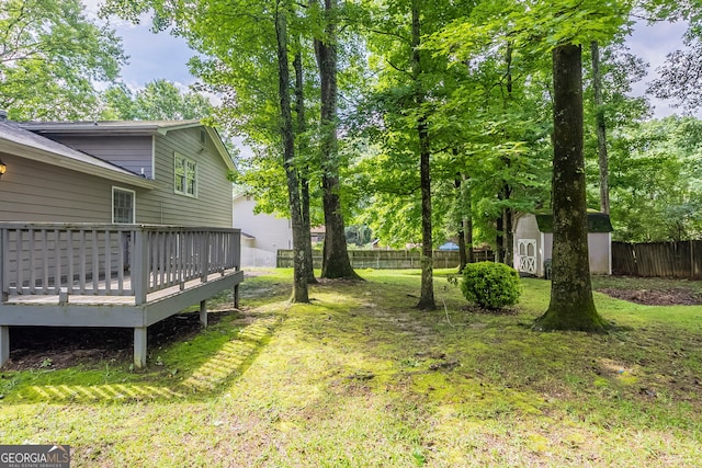 3110 Ashly Cove Ln, Snellville, GA 30078 - fenced backyard featuring a shed and a deck