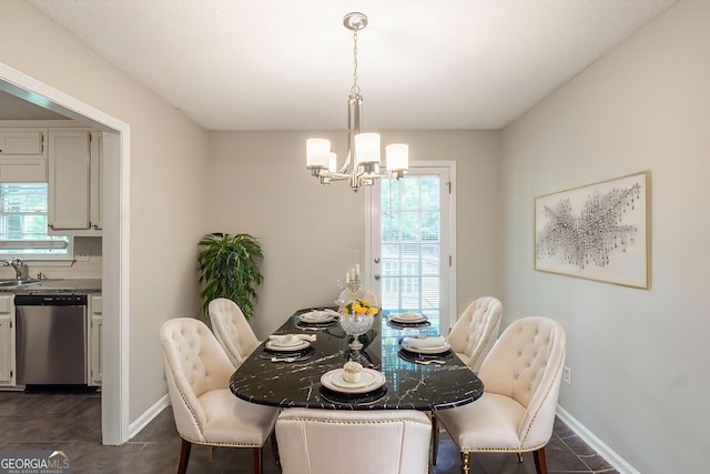 3110 Ashly Cove Ln, Snellville, GA 30078 - dining space with a chandelier and baseboards