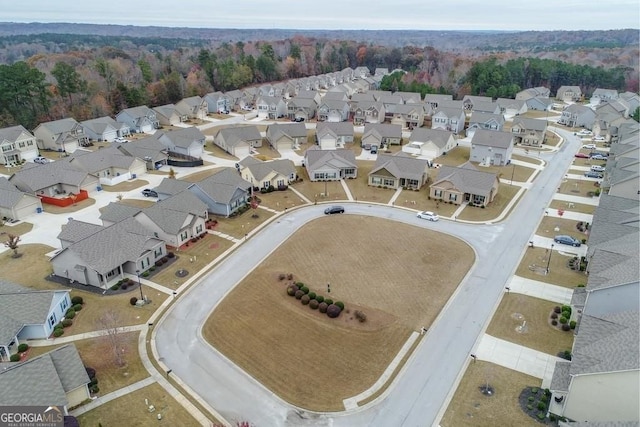 691 Walnut Woods Dr, Braselton, GA 30517 - aerial perspective of suburban area with a heavily wooded area