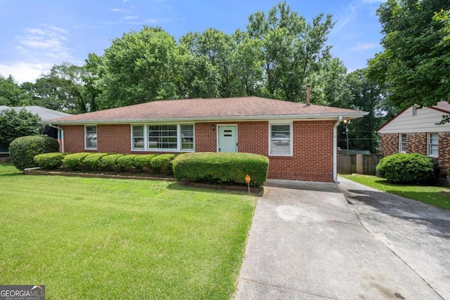 135 5th Ave, Jonesboro, GA 30236 - single story home with brick siding and concrete driveway