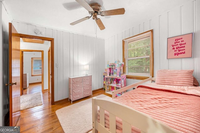 135 5th Ave, Jonesboro, GA 30236 - bedroom with light wood-style floors and ceiling fan