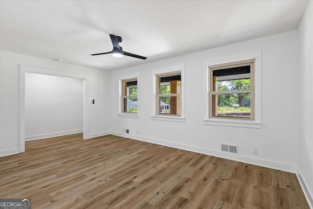 1400 N Ave NW, Atlanta, GA 30318 - spare room featuring wood finished floors and a ceiling fan