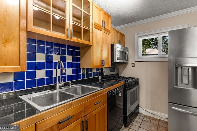 115 Biscayne Dr NW Unit E3, Atlanta, GA 30309 - kitchen featuring stainless steel appliances, tile countertops, crown molding, glass insert cabinets, and tasteful backsplash