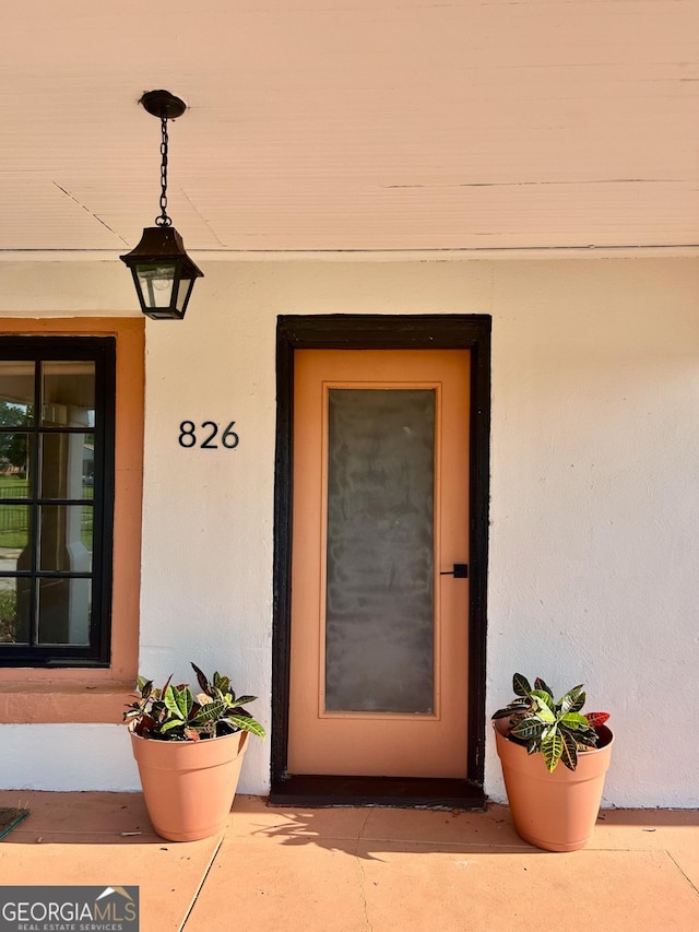 826 W Grenada Ter, Macon, GA 31206 - view of exterior entry with stucco siding