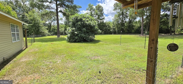 467 Witherington Cir, East Dublin, GA 31027 - view of yard with view of wooded area