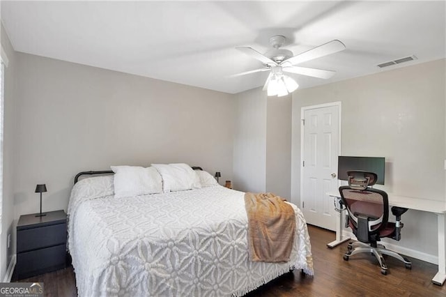410 Sheringham Ct, Roswell, GA 30076 - bedroom featuring dark wood-style floors, a desk, and a ceiling fan