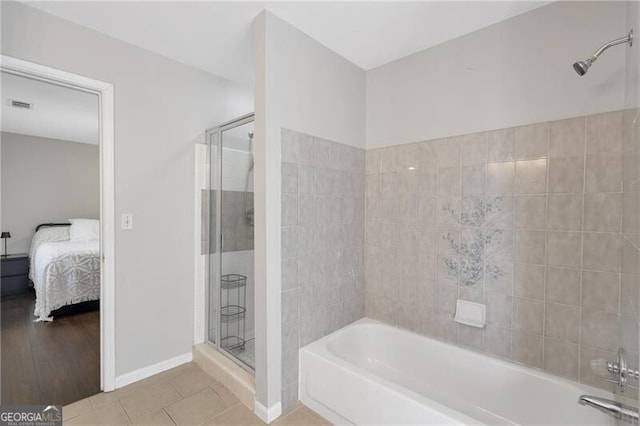 410 Sheringham Ct, Roswell, GA 30076 - bathroom featuring a shower stall, connected bathroom, a tub to relax in, and tile patterned flooring