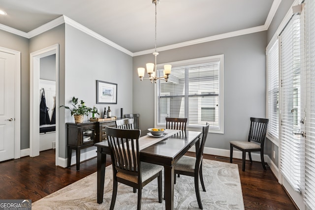 2470 Green Mountain Dr, Braselton, GA 30517 - dining room featuring a chandelier, wood finished floors, and ornamental molding