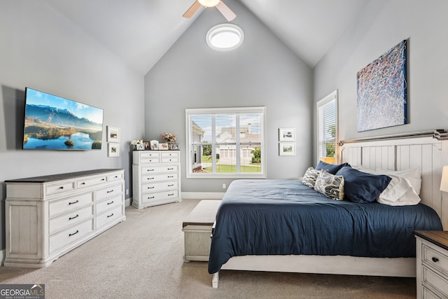 2470 Green Mountain Dr, Braselton, GA 30517 - bedroom featuring light carpet, multiple windows, ceiling fan, and high vaulted ceiling