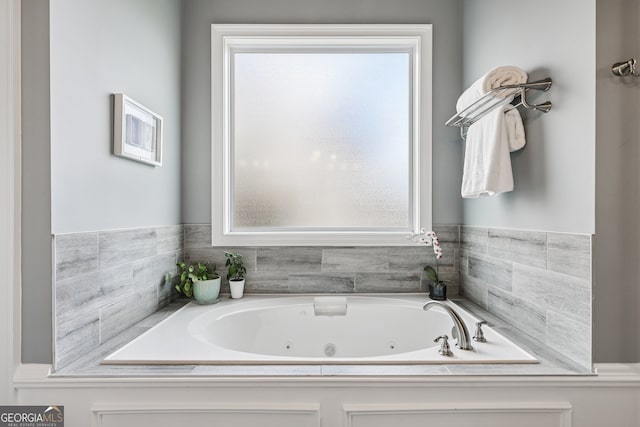 2470 Green Mountain Dr, Braselton, GA 30517 - bathroom featuring plenty of natural light and a tub with jets