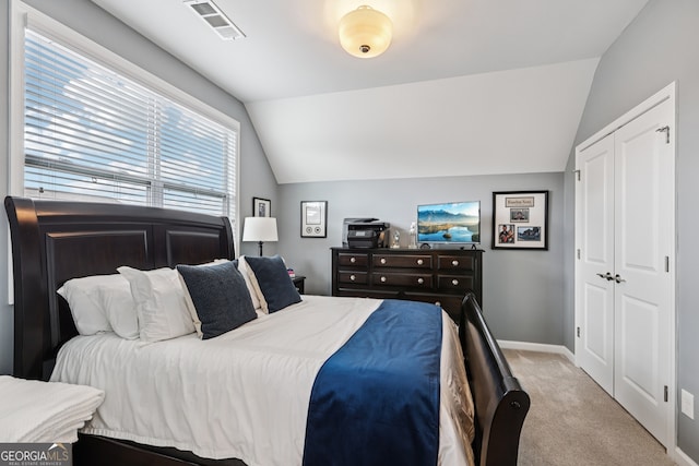 2470 Green Mountain Dr, Braselton, GA 30517 - bedroom with vaulted ceiling, carpet, and a closet
