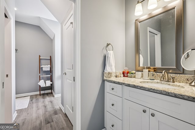 2470 Green Mountain Dr, Braselton, GA 30517 - bathroom featuring vanity and wood finished floors