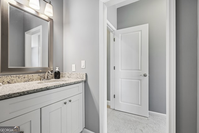 2470 Green Mountain Dr, Braselton, GA 30517 - bathroom featuring vanity and baseboards