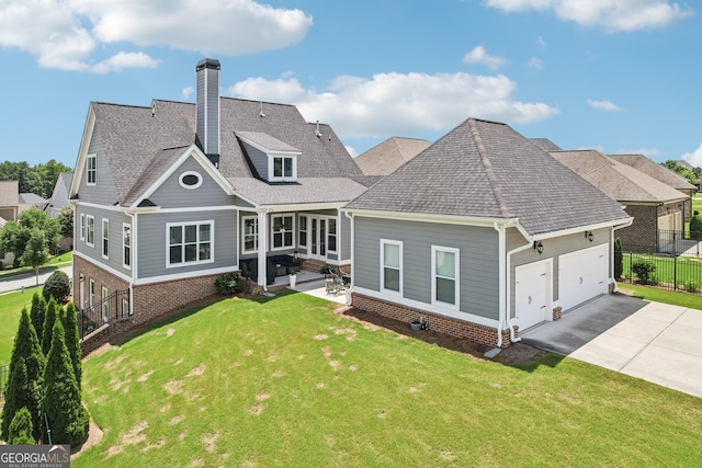 2470 Green Mountain Dr, Braselton, GA 30517 - rear view of property featuring concrete driveway, a chimney, an attached garage, brick siding, and a shingled roof