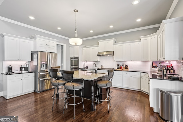 2470 Green Mountain Dr, Braselton, GA 30517 - kitchen with stainless steel refrigerator with ice dispenser, under cabinet range hood, white cabinetry, decorative backsplash, and recessed lighting