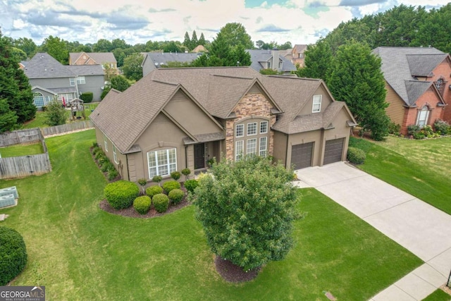1511 Rocky Knoll Ln, Dacula, GA 30019 - view of front of property with stucco siding, stone siding, concrete driveway, and a residential view