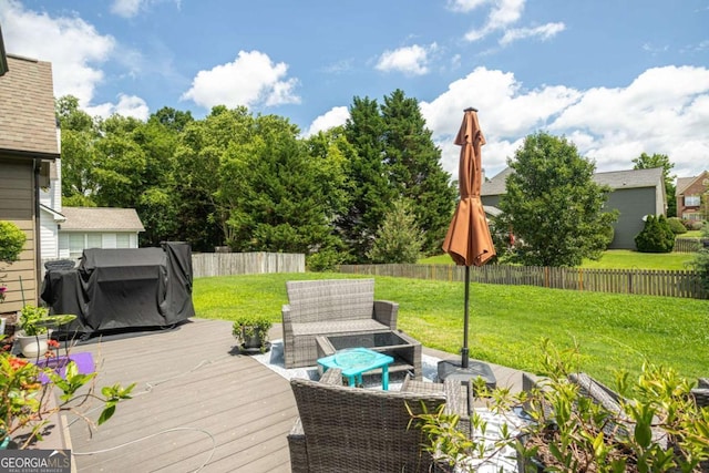 1511 Rocky Knoll Ln, Dacula, GA 30019 - wooden terrace with an outdoor hangout area, a fenced backyard, and a grill