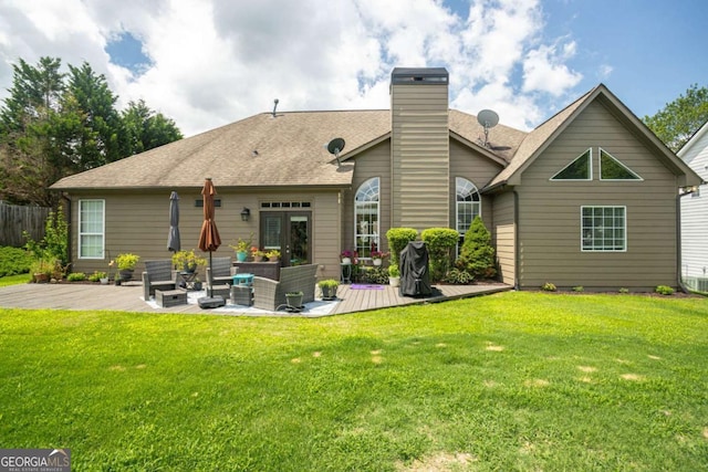 1511 Rocky Knoll Ln, Dacula, GA 30019 - back of property with a chimney, a yard, and an outdoor living space