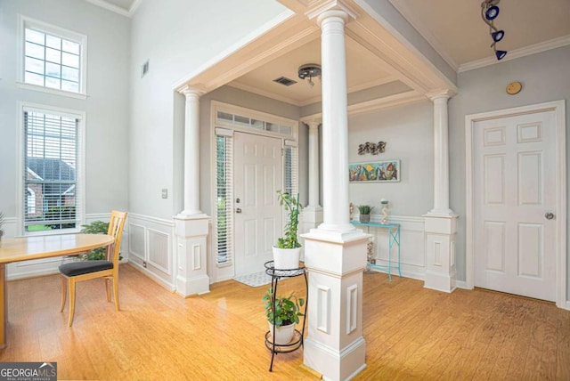 1511 Rocky Knoll Ln, Dacula, GA 30019 - foyer with decorative columns, light wood-type flooring, a decorative wall, and ornamental molding