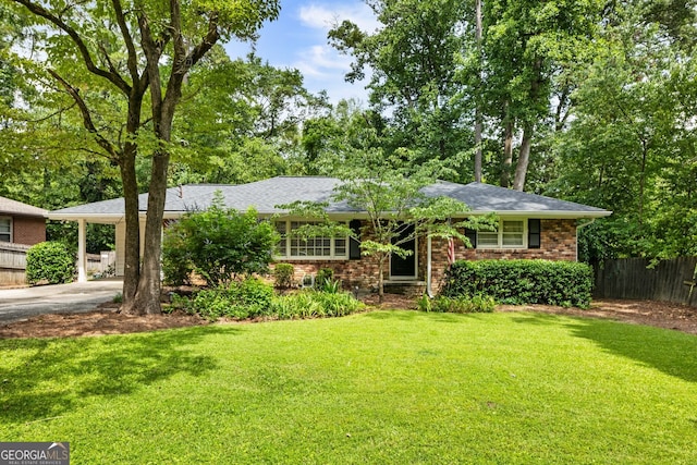 2163 Medfield Trl NE, Chamblee, GA 30345 - ranch-style house featuring asphalt driveway, brick siding, a carport, and roof with shingles