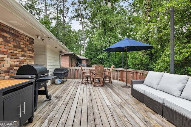 2163 Medfield Trl NE, Chamblee, GA 30345 - deck featuring outdoor lounge area, outdoor dining area, a grill, and view of wooded area