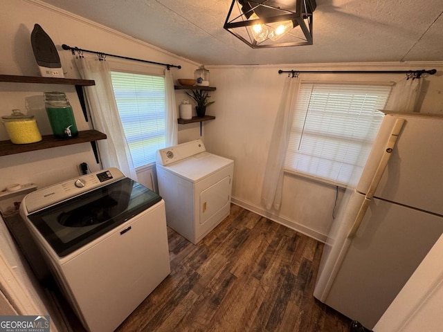56 Harry Pauls Rd, Danielsville, GA 30633 - laundry area with washer and clothes dryer, a textured ceiling, dark wood-type flooring, crown molding, and a chandelier