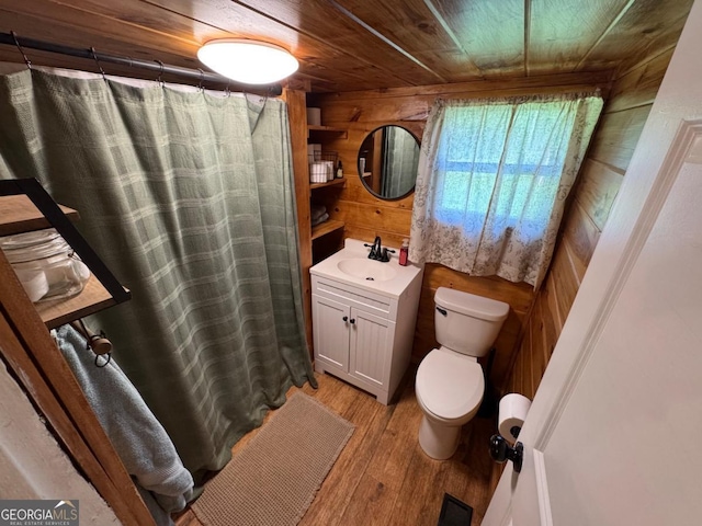 56 Harry Pauls Rd, Danielsville, GA 30633 - full bathroom with vanity, wooden ceiling, wood finished floors, wood walls, and a shower with curtain