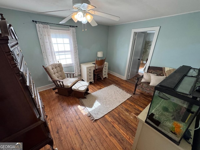 56 Harry Pauls Rd, Danielsville, GA 30633 - living area featuring a ceiling fan, hardwood / wood-style flooring, and crown molding