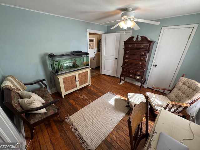 56 Harry Pauls Rd, Danielsville, GA 30633 - living area with a ceiling fan, wood-type flooring, and crown molding