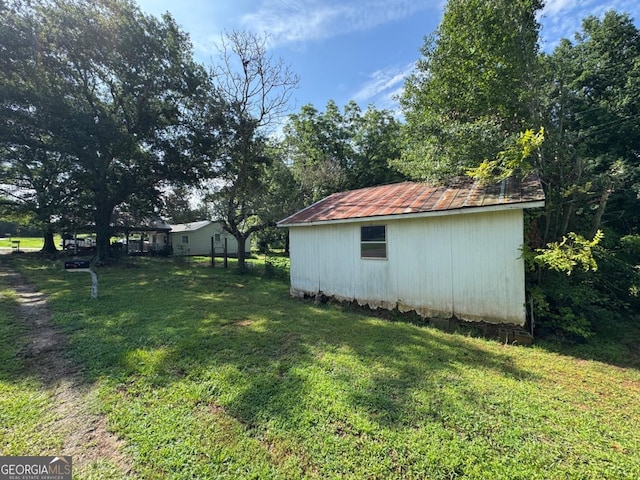 56 Harry Pauls Rd, Danielsville, GA 30633 - view of green lawn with an outdoor structure