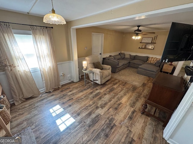 56 Harry Pauls Rd, Danielsville, GA 30633 - living room with wood finished floors, ceiling fan, and wainscoting