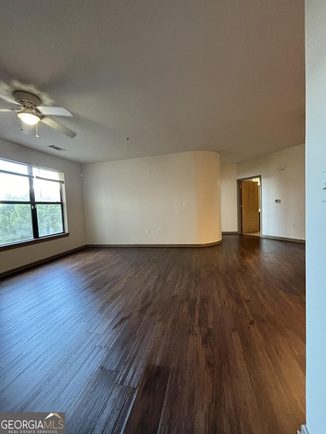 898 Oak St SW Unit 1215, Atlanta, GA 30310 - unfurnished room with dark wood-style floors and ceiling fan