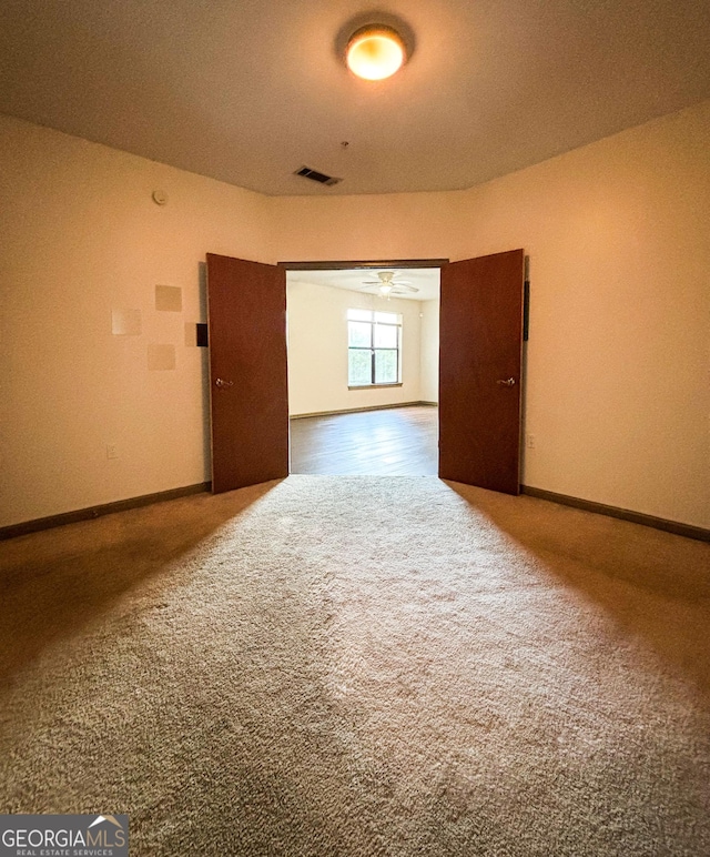 898 Oak St SW Unit 1215, Atlanta, GA 30310 - unfurnished room featuring carpet floors and a ceiling fan
