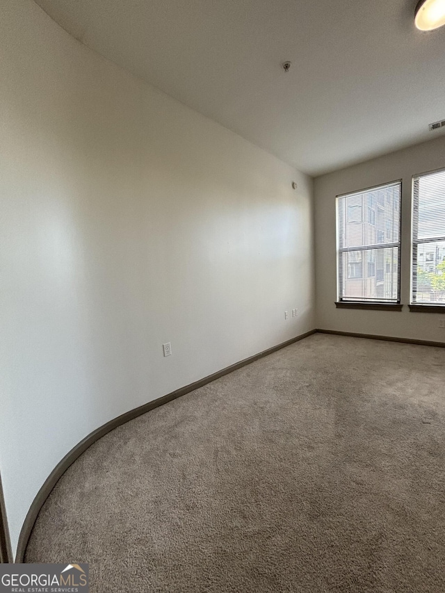 898 Oak St SW Unit 1215, Atlanta, GA 30310 - unfurnished room featuring carpet floors and fire sprinkler in ceiling