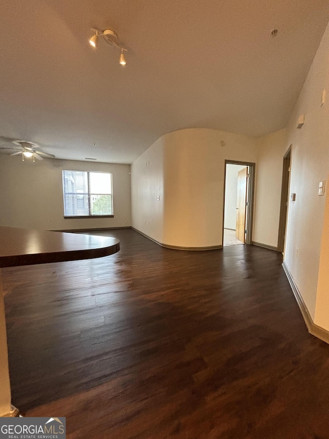 898 Oak St SW Unit 1215, Atlanta, GA 30310 - empty room with dark wood-style floors and ceiling fan