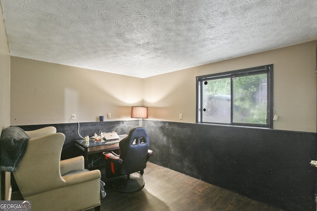 1271 Muirforest Ln, Stone Mountain, GA 30088 - home office with wood finished floors, a textured ceiling, and wainscoting