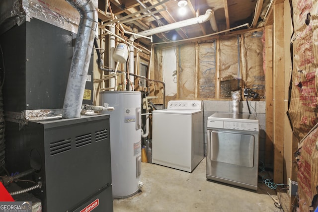 1271 Muirforest Ln, Stone Mountain, GA 30088 - unfinished below grade area featuring electric water heater, heating unit, and washing machine and clothes dryer