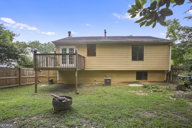 1271 Muirforest Ln, Stone Mountain, GA 30088 - back of house featuring a fenced backyard and a deck