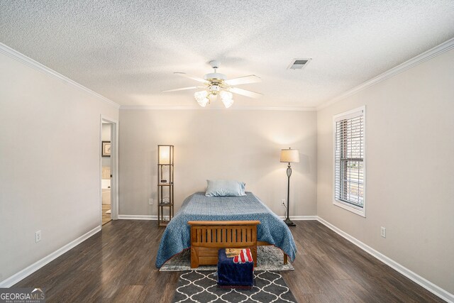 149 Crown Oaks Dr, Stockbridge, GA 30281 - bedroom with wood finished floors, a textured ceiling, crown molding, and ceiling fan