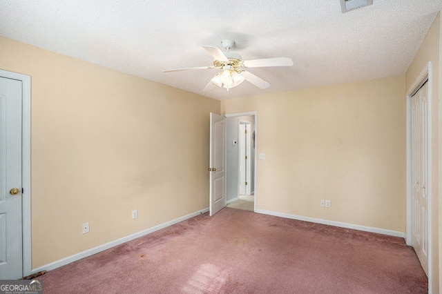 149 Crown Oaks Dr, Stockbridge, GA 30281 - unfurnished bedroom featuring carpet, ceiling fan, and a closet