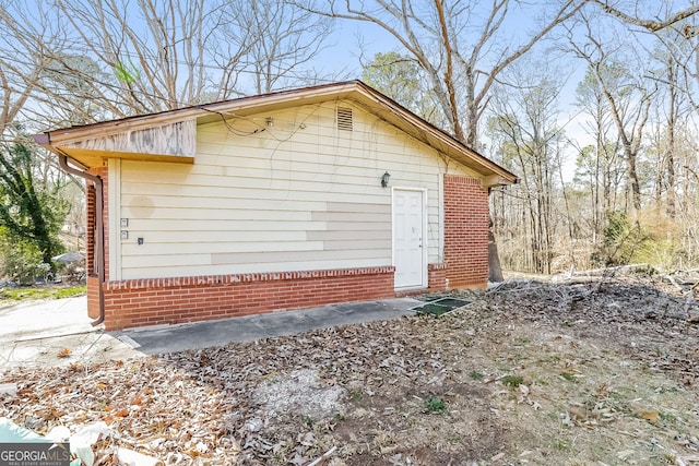 2522 Frost Dr SW, Marietta, GA 30008 - view of side of property with brick siding