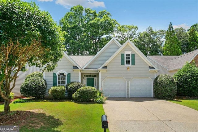 13440 Avensong Xing, Alpharetta, GA 30004 - view of front of property featuring concrete driveway, an attached garage, and a front yard