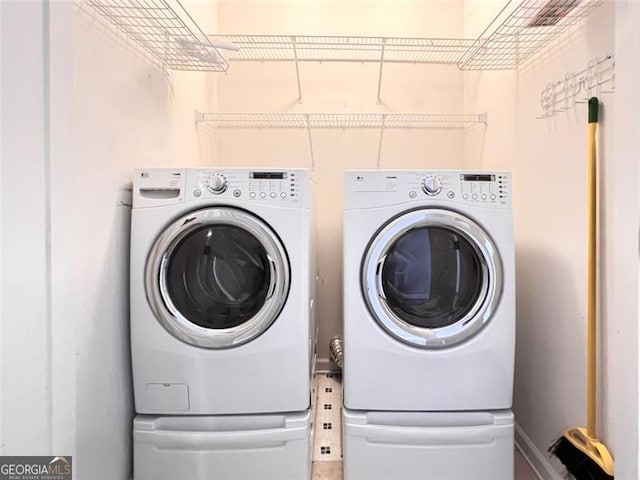 13440 Avensong Xing, Alpharetta, GA 30004 - laundry room with washing machine and clothes dryer