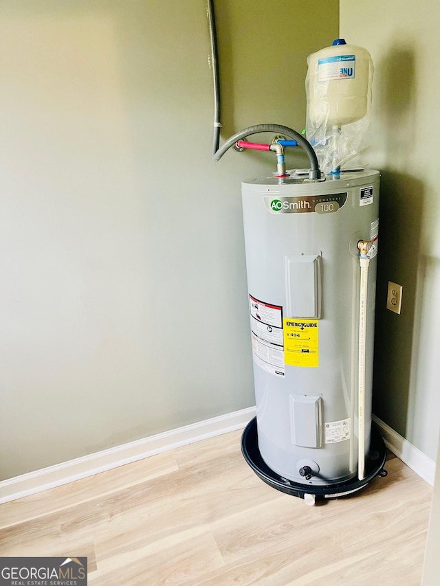 935 Mccall Rd, Macon, GA 31217 - utility room featuring electric water heater