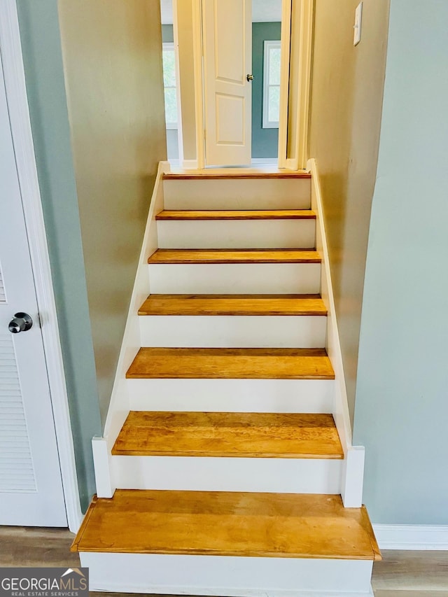 935 Mccall Rd, Macon, GA 31217 - staircase featuring wood finished floors