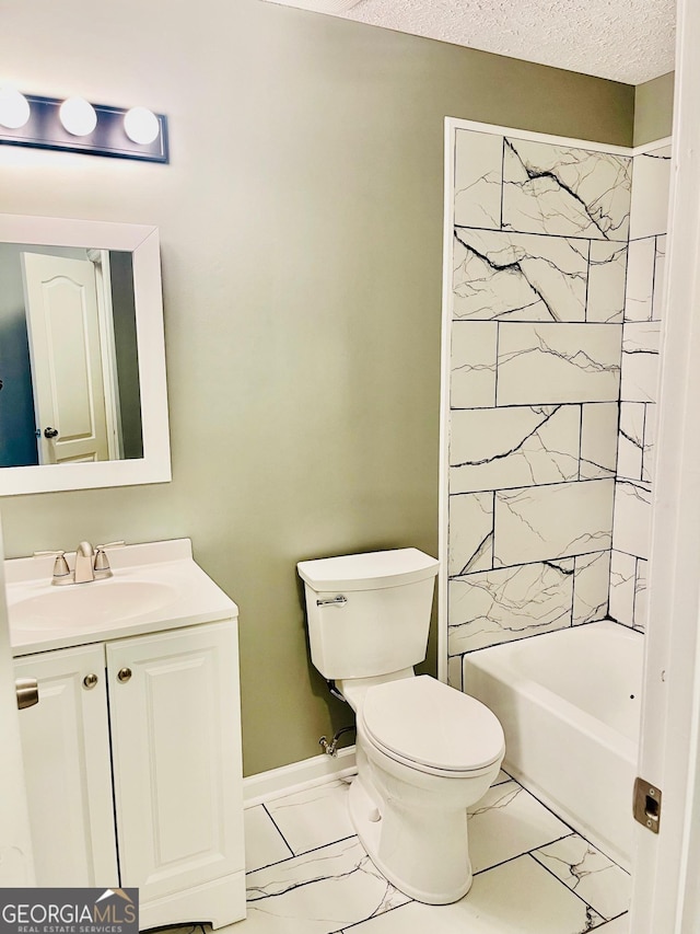 935 Mccall Rd, Macon, GA 31217 - full bath with vanity, marble look tiles, shower / bath combination, and a textured ceiling