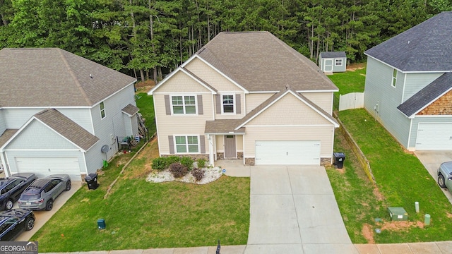 232 Shelton Cir, Temple, GA 30179 - view of front of property with concrete driveway, stone siding, and a view of trees