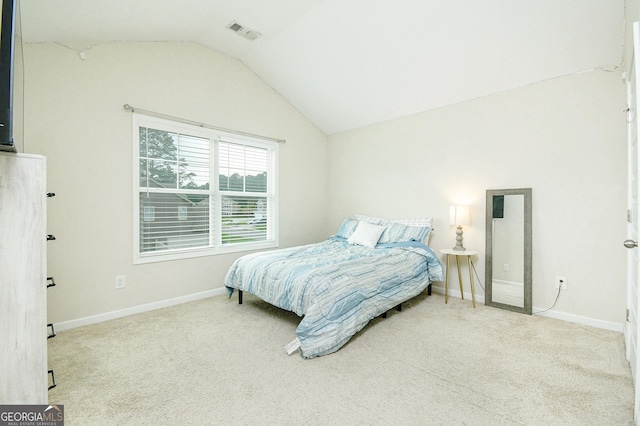 232 Shelton Cir, Temple, GA 30179 - carpeted bedroom with vaulted ceiling and baseboards