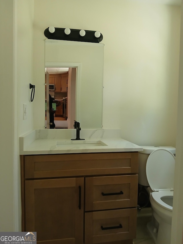6985 Butner Rd, South Fulton, GA 30349 - half bath with vanity and toilet